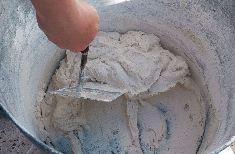 Mortero de anclaje de un marco para puerta sin marco